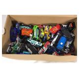 Box of small toy cars