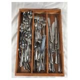 Flatware assortment in wood tray