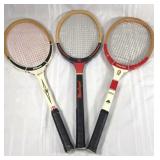 Three vintage tennis rackets