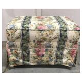 Floral ottoman on caster wheels