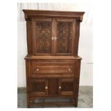 Antique carved oak china cabinet