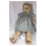 Creepy antique doll