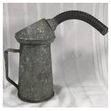 Old galvanized oil can