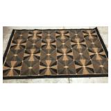 Black and brown area rug