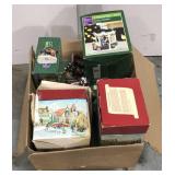 Box of collectible Christmas figures