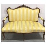Antique carved settee