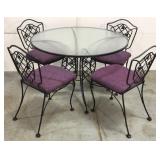 Wrought iron patio table with chairs