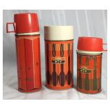 Trio of vintage thermoses