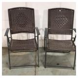 Two folding patio chairs