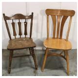 Two wood dining chairs