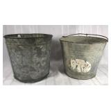 Two old galvanized metal buckets