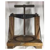 Primitive wood and cast iron press