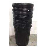 Seven gently used trash cans