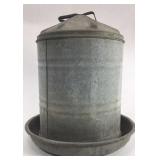 Vintage galvanized chicken feeder