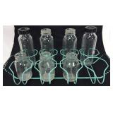 Vintage glass baby bottles and rack