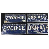 Two 1973 matching license plate pairs
