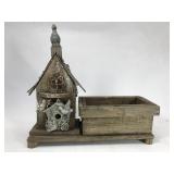 Weathered birdhouse and planter