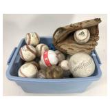 Tub of baseballs + practice balls + glove