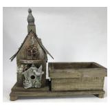 Weathered birdhouse and planter