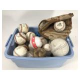 Tub of baseballs + practice balls + glove