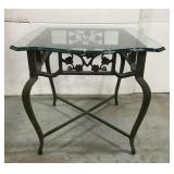 Cast metal glass top side table