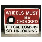 Vintage chocked wheels sign