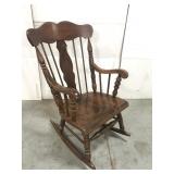 Dark wood rocking chair