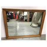 Wood framed wall mirror