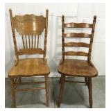Two wood dining chairs