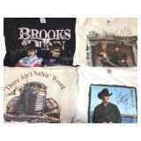 Four signed country music star T-shirts