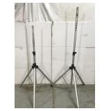 Two aluminum telescoping speaker tripod stands