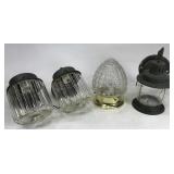 Four glass outdoor wall light fixtures