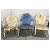 Set of three metal shell back patio chairs