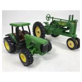 Two John Deere toy tractors