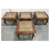 Set of four vintage cane + glass top tables