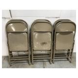 Set of nine metal folding chairs