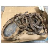 Lot of old rusty horse shoes