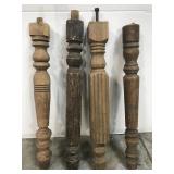 Four antique wooden table legs