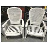 Two oversized reclining patio chairs