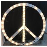 Handmade large lighted peace sign