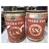 Two old Magna-Pak wire drums
