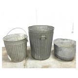Three old galvanized cans