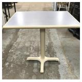 Metal base restaurant table