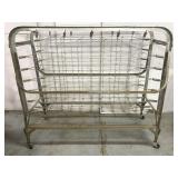 Foldable metal bed frame on wheels