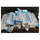Lot of 33 new packages of tent stakes