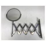 Accordion style bathroom wall mirror