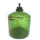 Antique green kerosene tank