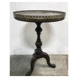 Wood end table with metal trimmed rim