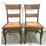 Pair of antique oak leather seat chairs