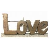 Rustic style metal love sign
